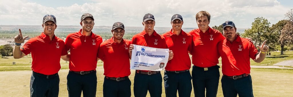 Texas tech mens's golf team poses in front of a hole in Albuquerque, New Mexico while holding up a white ncaa regional flag 